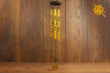 Dzwonki wietrzne MINI znak OM złote z czarnymi symbolami - poprawa FENG SHUI pomieszczenia